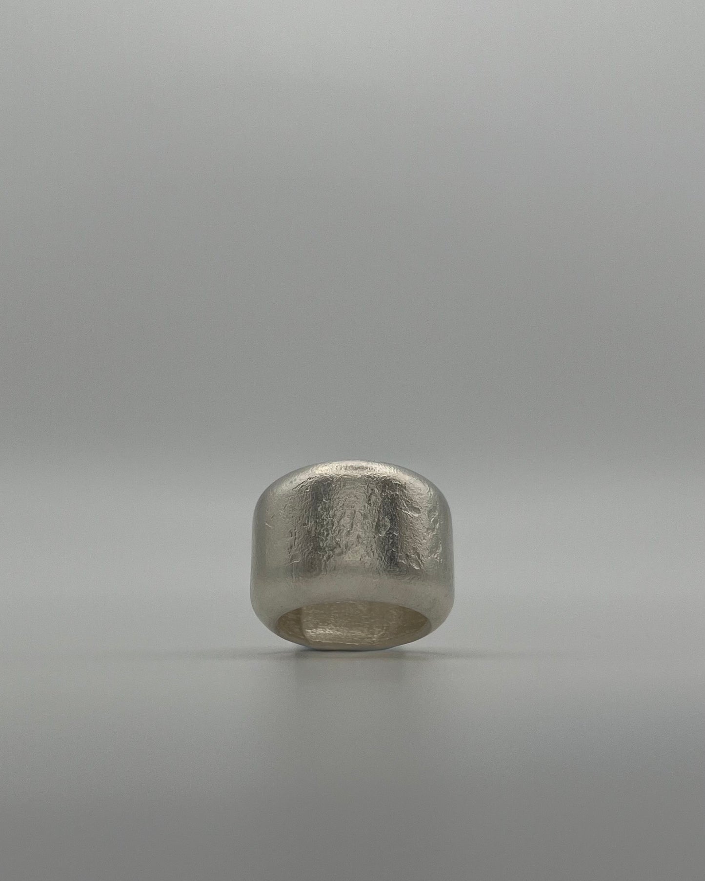 Kneeling Figure in Silver