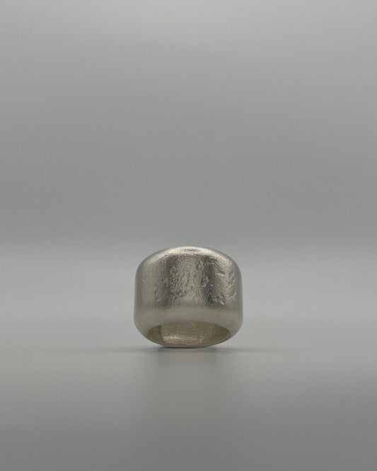 Kneeling Figure in Silver