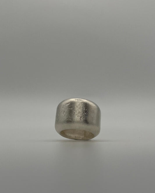 Kneeling Figure in Silver